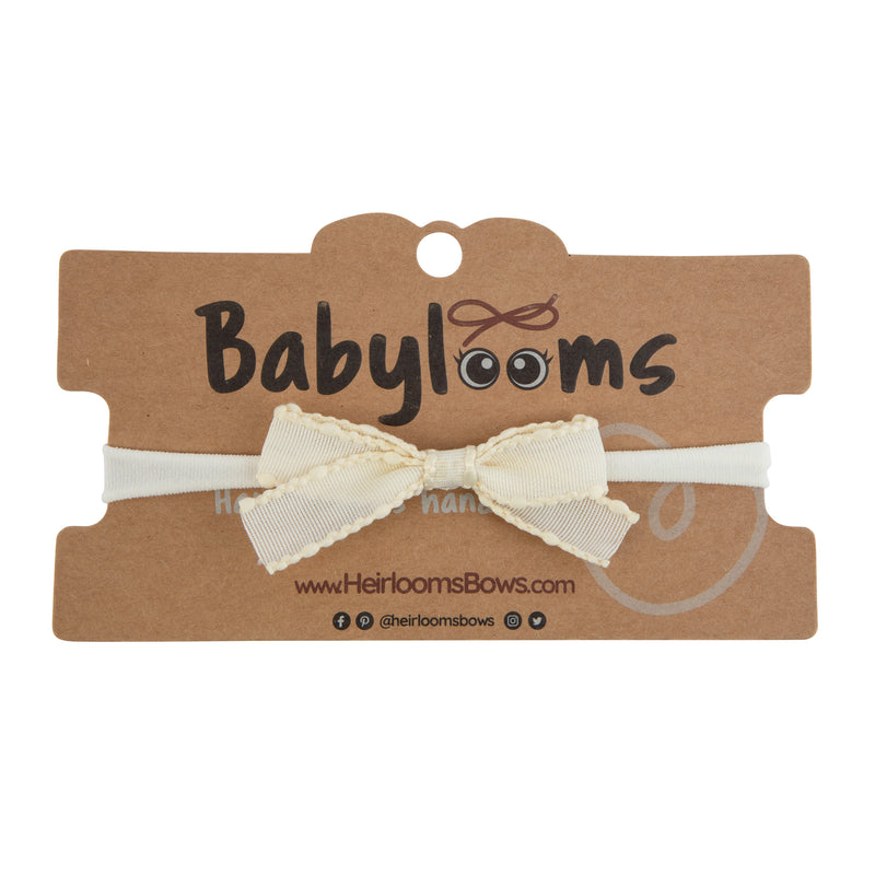 B1355 HEIRLOOMS EDGED RIBBON BABY BAND