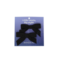 BANDEAU TEXTURED VELVET BOW CLIP